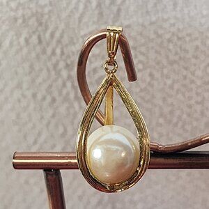 Avon Vintage Large Cream Floating Faux Pearl Inside a Gold Tone Cage Pendant